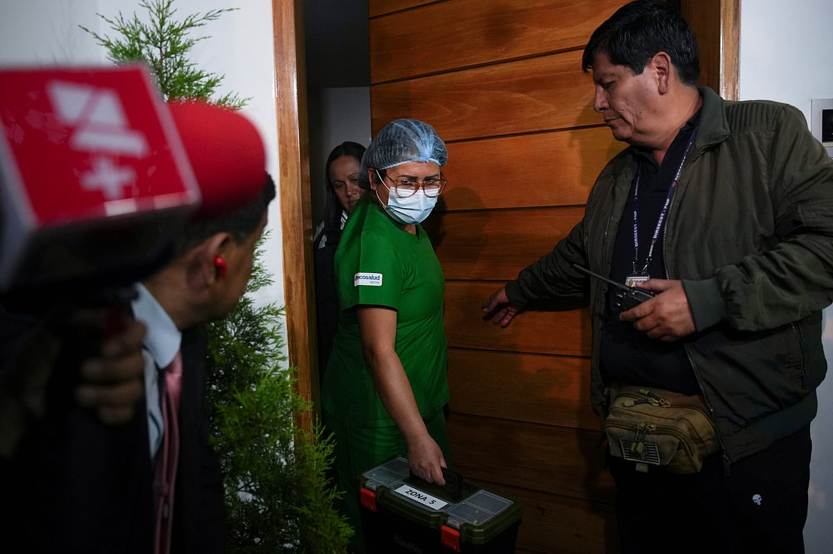 AP : A nurse leaves Keiko Fujimori's house, where her father, former President Alberto Fujimori, was staying, Wednesday, in Lima, Peru, Sept. 11, 2024. Keiko announced in a post on X that her father died Wednesday. 